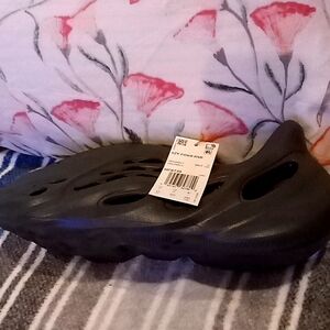Brand New Size 12 Yeezy Foam Runner. Charcoal color.